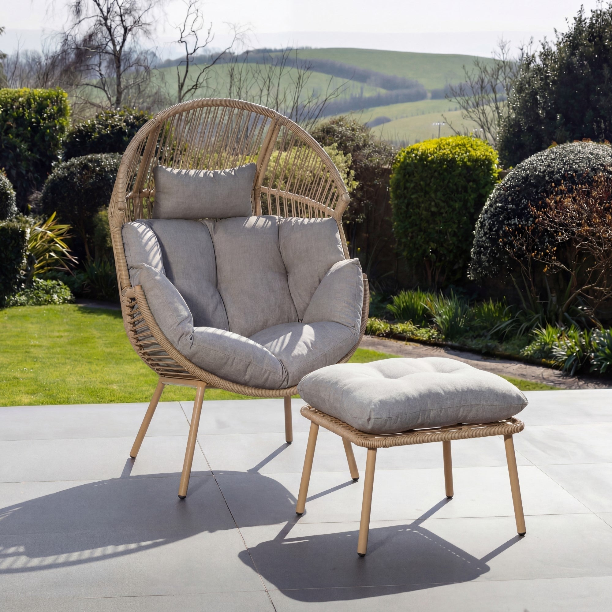 Cragside - Standing Egg Chair & Footstool in Light Brown on Natural